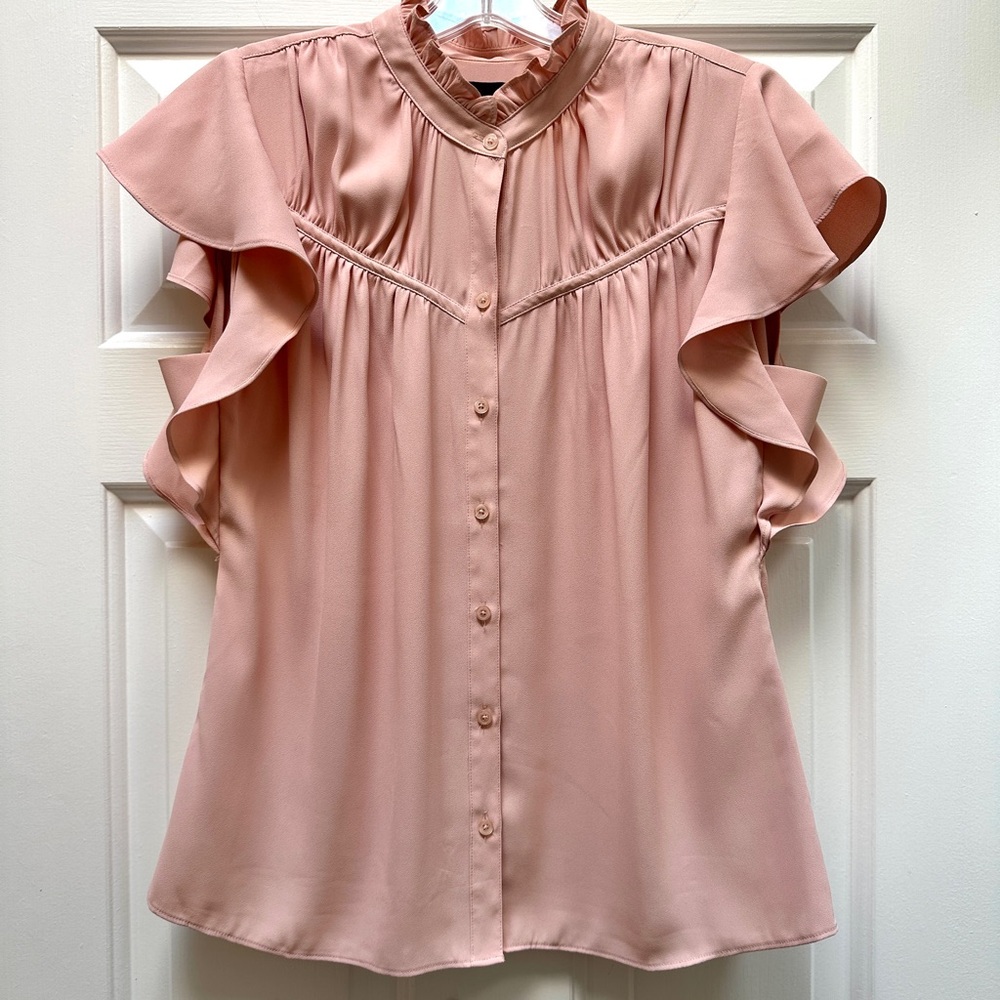White House Black Market medium pink top with ruffled short sleeves and collar.
